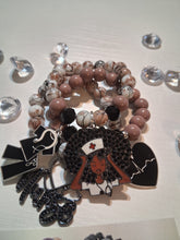 Load image into Gallery viewer, Nurse in brown and black
