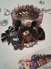 Load image into Gallery viewer, Nurse in brown and black
